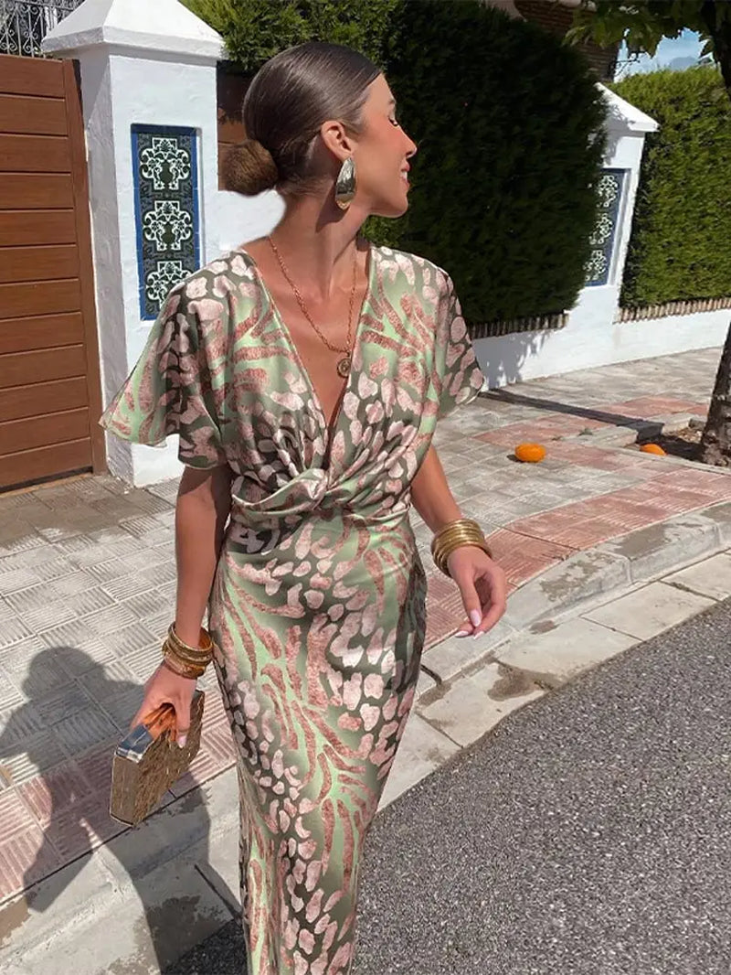 Solène V-neck elegant dress - model wearing, outdoor lifestyle | Vireza Boutique
