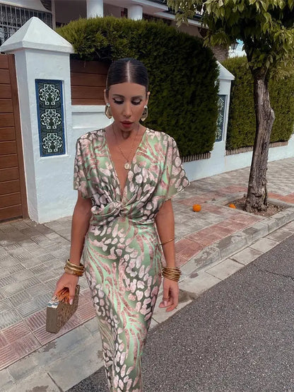 Solène V-neck elegant dress - model wearing, outdoor lifestyle | Vireza Boutique
