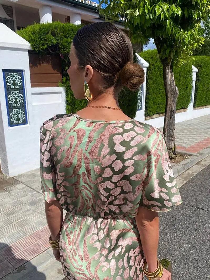 Solène V-neck elegant dress - model wearing, outdoor lifestyle | Vireza Boutique