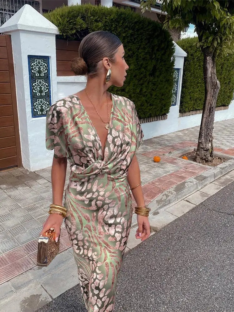 Solène V-neck elegant dress - model wearing, outdoor lifestyle | Vireza Boutique